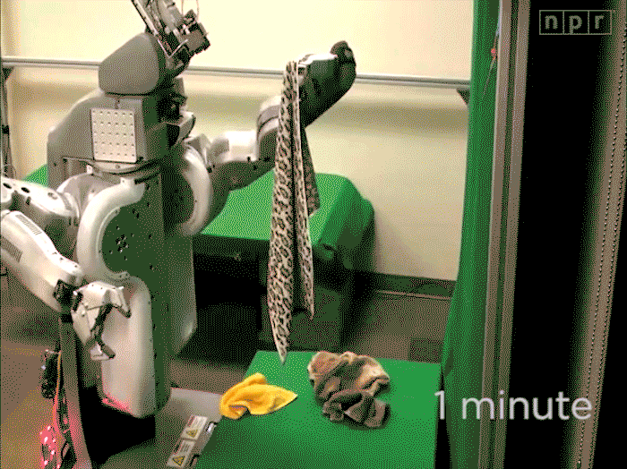 A robot taking ten minutes to fold a towel
